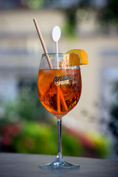 Mulhouse - France - 23 July 2020 - Closeup of aperol spriz glass at the terrace of restaurant in the street