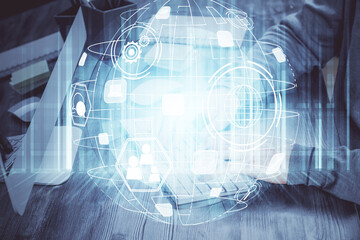 Social network theme hologram with businessman working on computer on background. Concept of world wide web. Multi exposure.