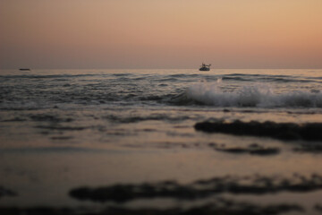 Alanya, TURKEY - August 10, 2013: Travel to Turkey. Sunset at the sea. The sun is leaving the...