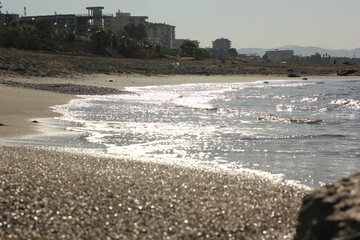 Alanya, TURKEY - August 10, 2013: Travel to Turkey. Beaches on the sea. Waves on the Mediterranean...