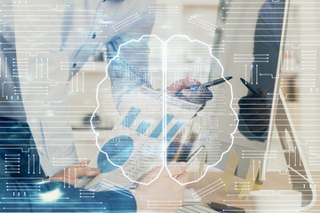 Man with computer background with brain theme hologram. Concept of brainstorm. Double exposure.
