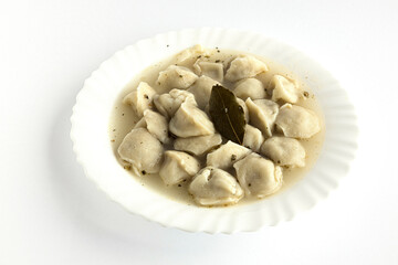 on a white background with pellets in the container