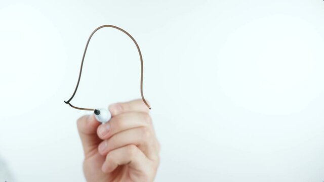 Video of man drawing female gender symbol