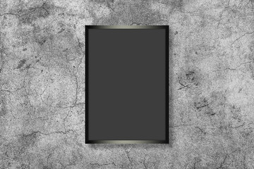 Blank white vertical rectangle poster mock up in black frame on a gray background.