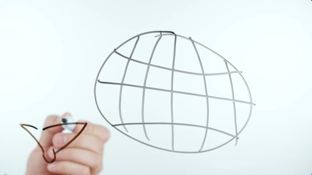 Shooting of man drawing planet with longitude and latitude
