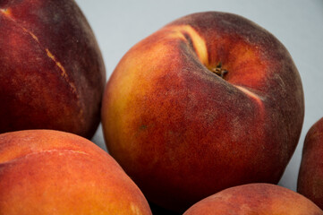 macro of fresh peaches on the table