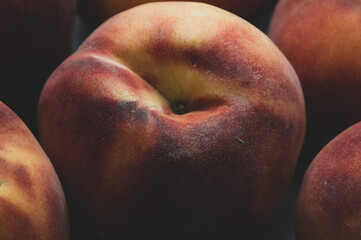 macro of fresh peaches on the table