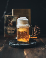 glass of beer on wooden table