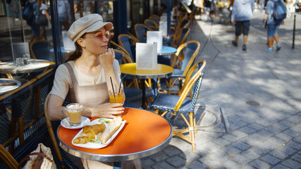 Attractive woman in a cafe in Paris