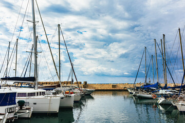 Obraz premium Sailboats in the old port of the ancient Jaffa. Tel Aviv, Israel.