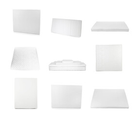 Set with modern comfortable mattresses on white background