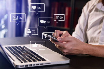 Social media and Marketing virtual icons screen concept.close up of businesswoman typing keyboard with laptop computer .