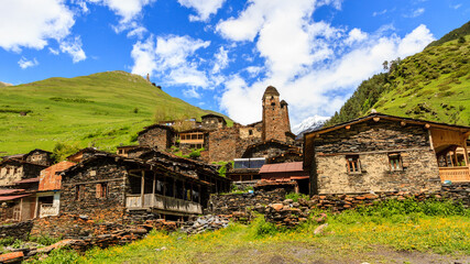 Fototapeta na wymiar Old mountain village Dartlo, Tusheti region, Georgia. Houses built from shale stones, ancient masonry. Caucasus mountains