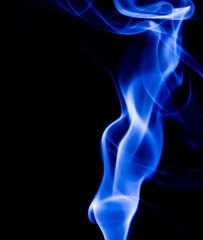 Blue smoke on black background