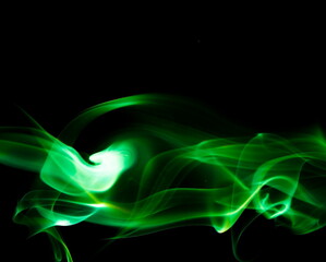 Green smoke on black background