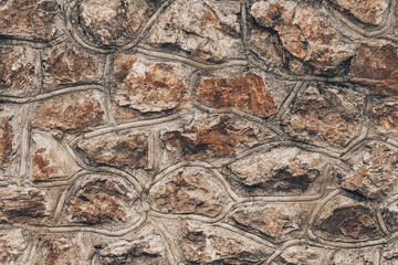 Dark Stone Wall Background. Toned, close up