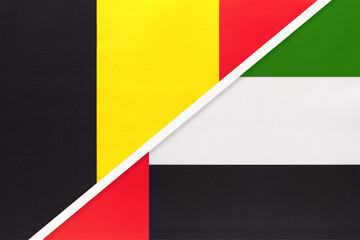 Belgium and UAE, symbol of two national flags from textile. Championship between two countries.