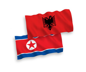 Flags of North Korea and Albania on a white background
