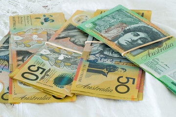 Bundles of Australian money 50 and 100 dollar notes