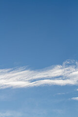 Naklejka na ściany i meble Blue sky. White cloud. Natural vertical background.