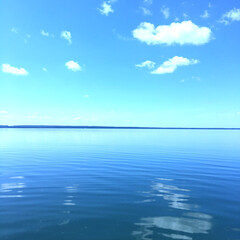 View of the turquoise sea and cliffs from the beach