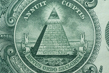 Fototapeta na wymiar Picture of Great Seal of the United States with writings Annuit Coeptis and Novus Ordo Seclorum, printed on One USA dollar banknote