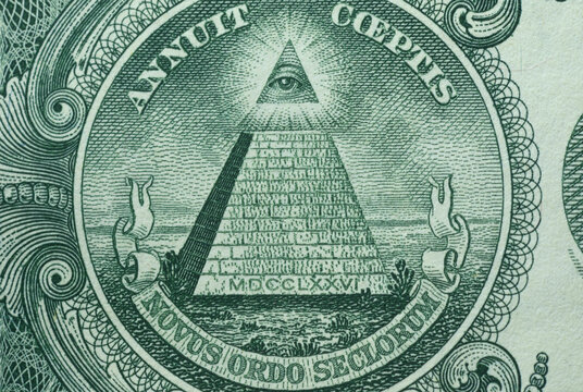 Picture of Great Seal of the United States with writings Annuit Coeptis and Novus Ordo Seclorum, printed on One USA dollar banknote