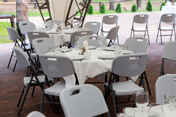 Banquet hall in the restaurant. Table served for festive dinner.