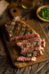 Roasted beef steak on a wooden desk