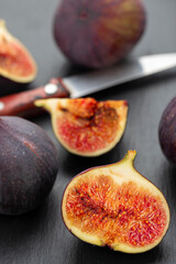 Fresh ripe figs in on a dark background.