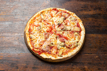 Delicious, freshly baked pizza. Fast food delivery. Bad but tasty food. Space for text or copy space. Restaurant menu advertise.