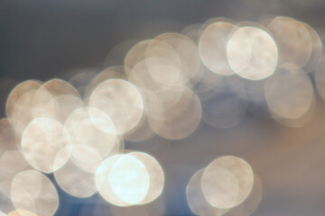 Blurred lights at twinkling at sunset background