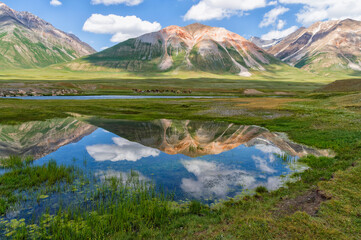 Naklejka na ściany i meble Mountains reflecting in water, Naryn gorge, Naryn Region, Kyrgyzstan