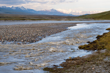 River in the Sary Jaz valley at sunrise, Issyk Kul region, Kyrgyzstan