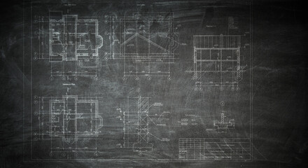 Architectural drafts on black board . Mixed media
