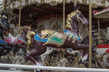 brown carousel horse in carousel in Madrid. Spain