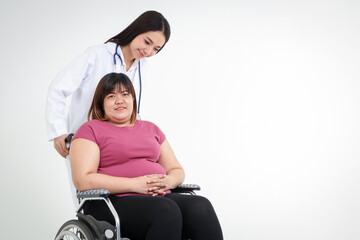 Asian fat woman sitting on a wheelchair Have a female doctor to help take care of inquiring about...