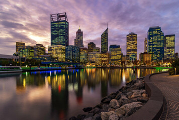 Elizabeth Quay Perth sunset cityscape. Reflections off water.