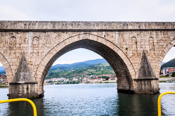 Historic bridge over the Drina River, Famous Tourist Attraction, The Mehmed Pasa Sokolovic Bridge in Visegrad, Bosnia and Herzegovina