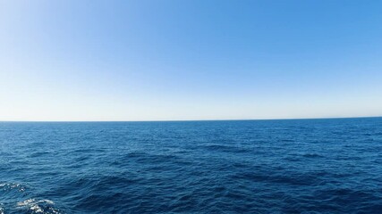 Beautiful vivd blue seascape from a moving ship