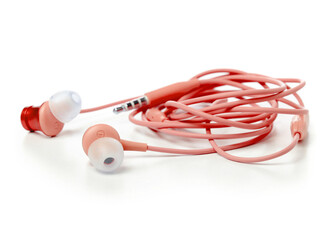 Red headphones sound on white background isolation