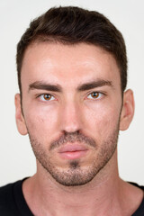 Obraz premium Portrait of handsome bearded man against white background