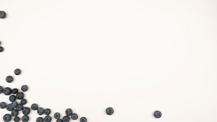 Raw blueberry frame on white background.