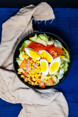 Delicious fresh salad and olive oil