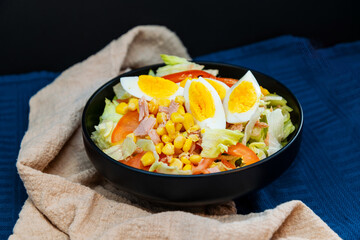 Delicious fresh salad and olive oil