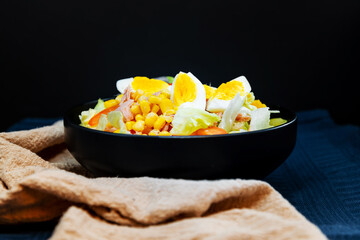 Delicious fresh salad and olive oil