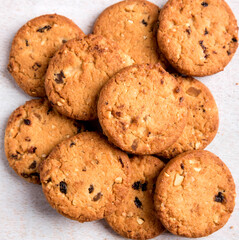 Freshly baked cookies with raisins and cashew nuts