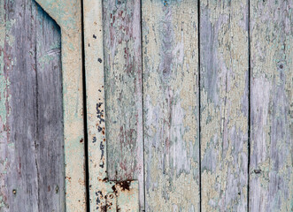 Wooden boards on an old fence as an abstract background.