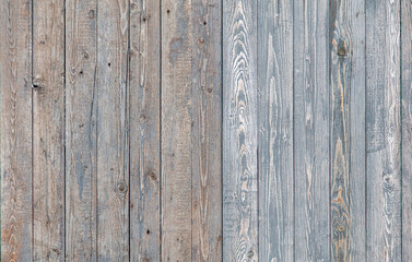 Wooden boards on an old fence as an abstract background.