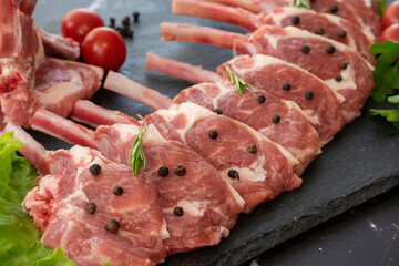 raw meat on a black background